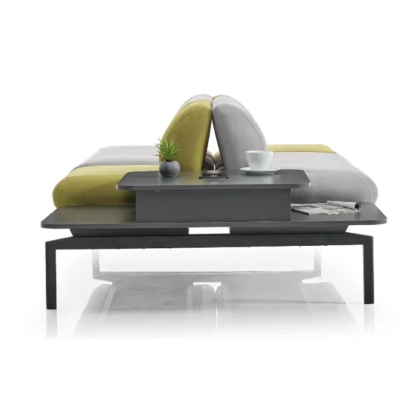 Yan profilden Modulo PLN-398, çift yönlü sehpa uzantısı ve yumuşak hatlı minderleriyle modüler bekleme koltuğu